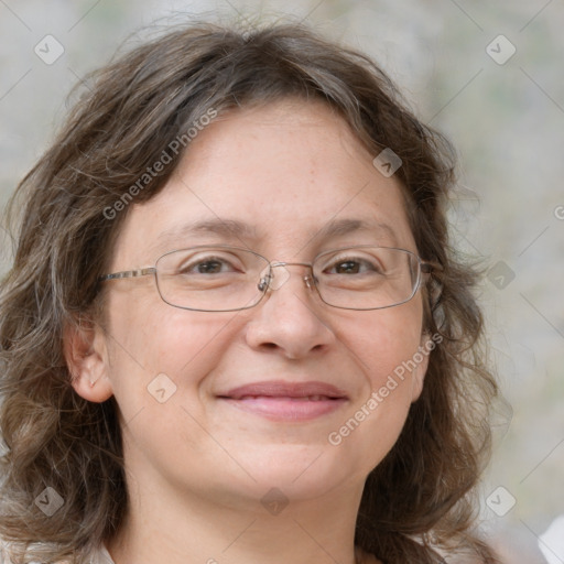 Joyful white adult female with long  brown hair and brown eyes