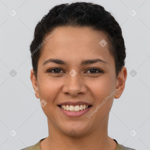 Joyful latino young-adult female with short  brown hair and brown eyes