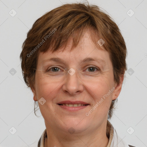 Joyful white adult female with medium  brown hair and grey eyes