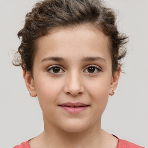 Joyful white child female with short  brown hair and brown eyes