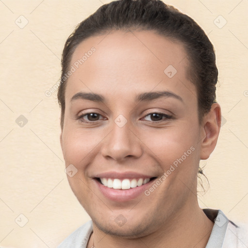 Joyful white young-adult female with short  brown hair and brown eyes