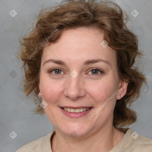 Joyful white adult female with medium  brown hair and blue eyes