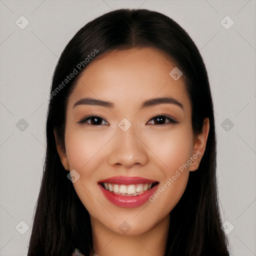 Joyful white young-adult female with long  black hair and brown eyes