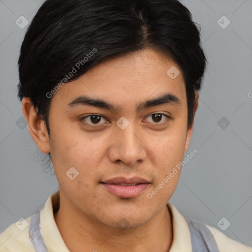 Joyful asian young-adult male with short  brown hair and brown eyes