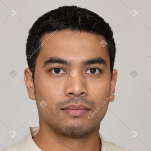 Neutral latino young-adult male with short  black hair and brown eyes