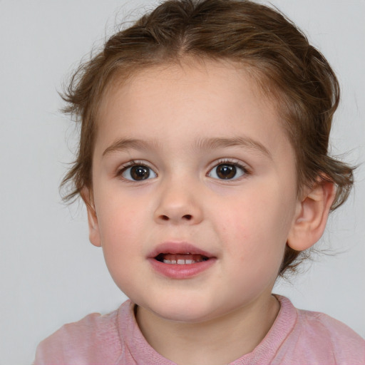 Joyful white child female with medium  brown hair and brown eyes