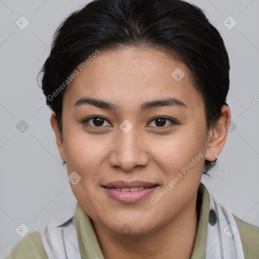 Joyful asian young-adult female with short  brown hair and brown eyes