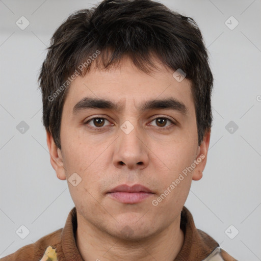 Neutral white young-adult male with short  brown hair and brown eyes