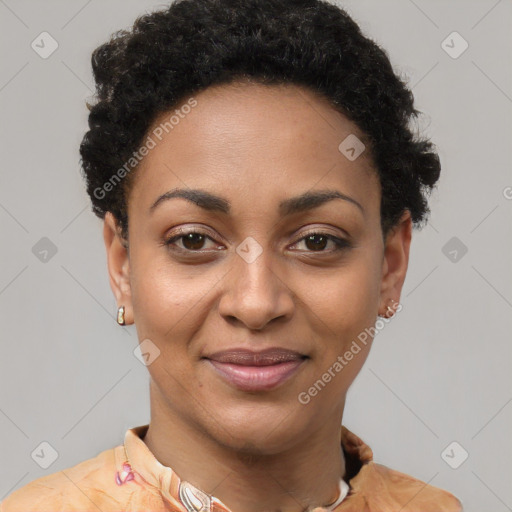 Joyful black adult female with short  brown hair and brown eyes