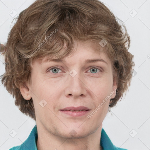 Joyful white adult female with short  brown hair and grey eyes