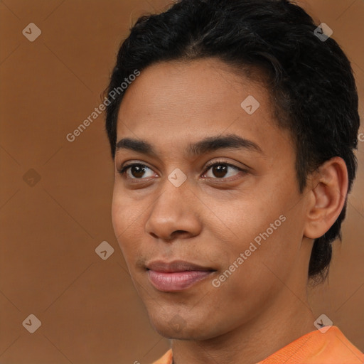 Joyful latino young-adult male with short  brown hair and brown eyes