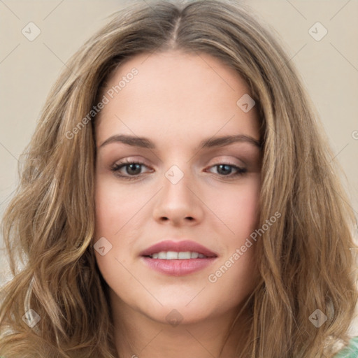 Joyful white young-adult female with long  brown hair and green eyes