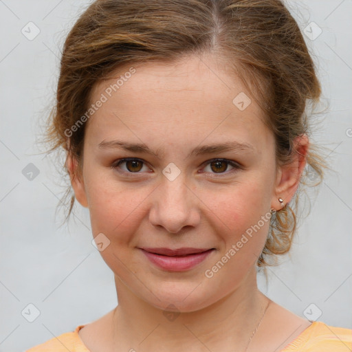 Joyful white young-adult female with medium  brown hair and grey eyes