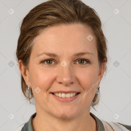 Joyful white adult female with medium  brown hair and grey eyes