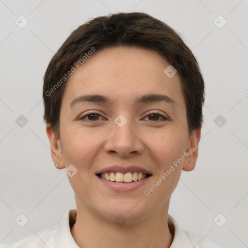 Joyful white young-adult female with short  brown hair and brown eyes