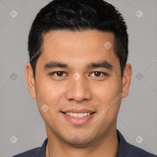 Joyful white young-adult male with short  black hair and brown eyes