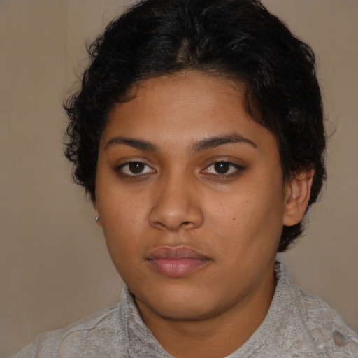 Neutral latino young-adult female with short  brown hair and brown eyes