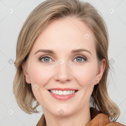 Joyful white young-adult female with medium  brown hair and blue eyes