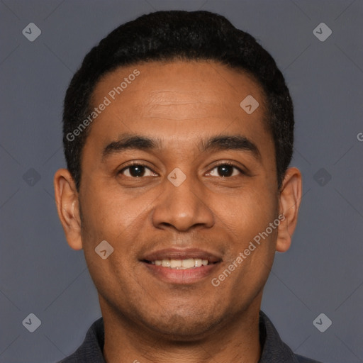 Joyful latino young-adult male with short  black hair and brown eyes