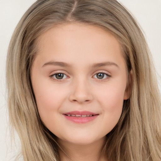 Joyful white child female with long  brown hair and brown eyes