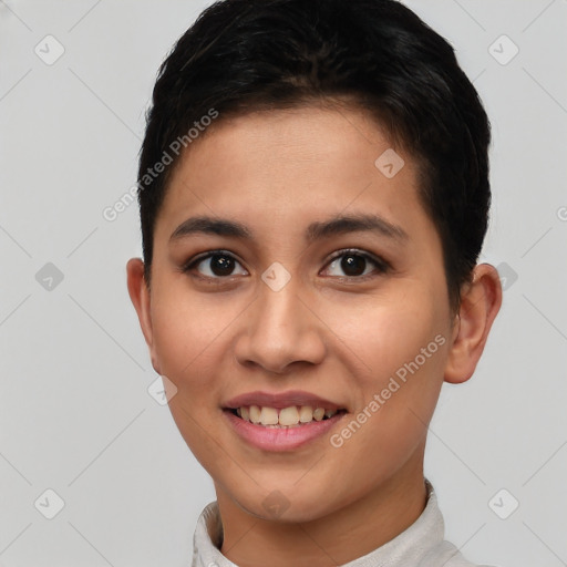 Joyful asian young-adult female with short  brown hair and brown eyes