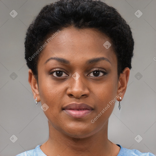 Joyful black young-adult female with short  black hair and brown eyes