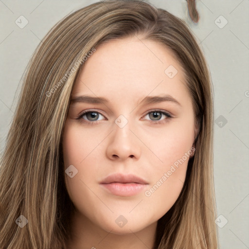 Neutral white young-adult female with long  brown hair and brown eyes