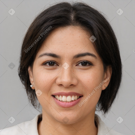 Joyful asian young-adult female with medium  brown hair and brown eyes