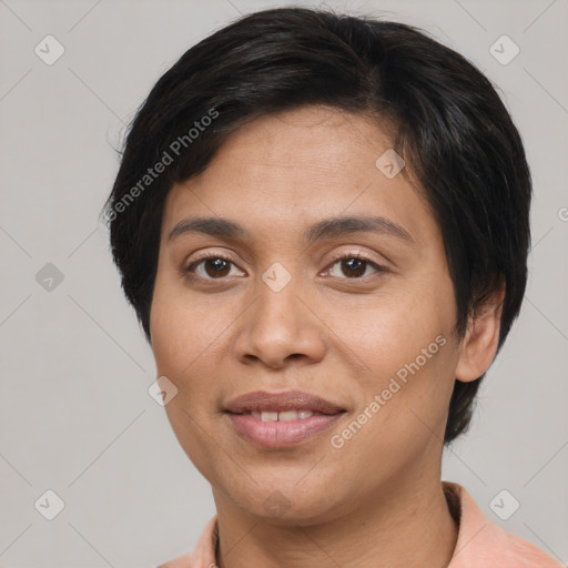 Joyful asian young-adult female with short  brown hair and brown eyes