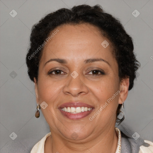 Joyful latino adult female with short  brown hair and brown eyes