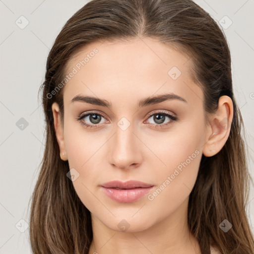 Neutral white young-adult female with long  brown hair and brown eyes