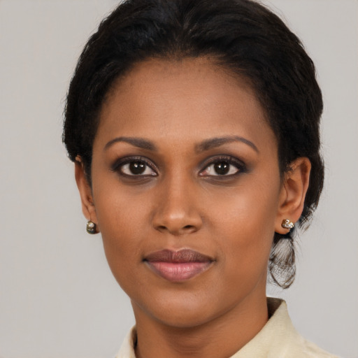 Neutral black young-adult female with short  brown hair and brown eyes