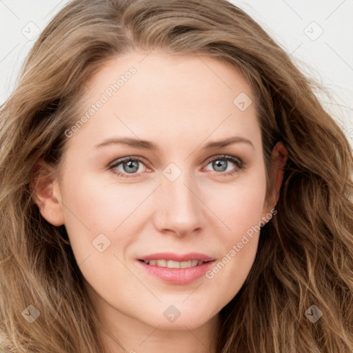 Joyful white young-adult female with long  brown hair and blue eyes