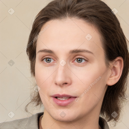 Neutral white young-adult female with medium  brown hair and brown eyes