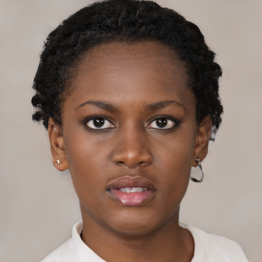 Neutral black young-adult female with short  black hair and brown eyes