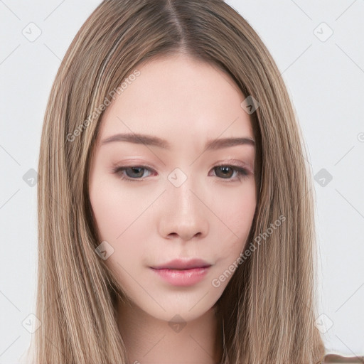 Neutral white young-adult female with long  brown hair and brown eyes