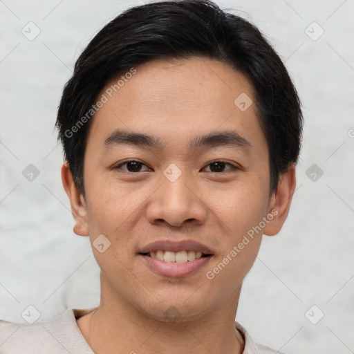 Joyful white young-adult male with short  black hair and brown eyes