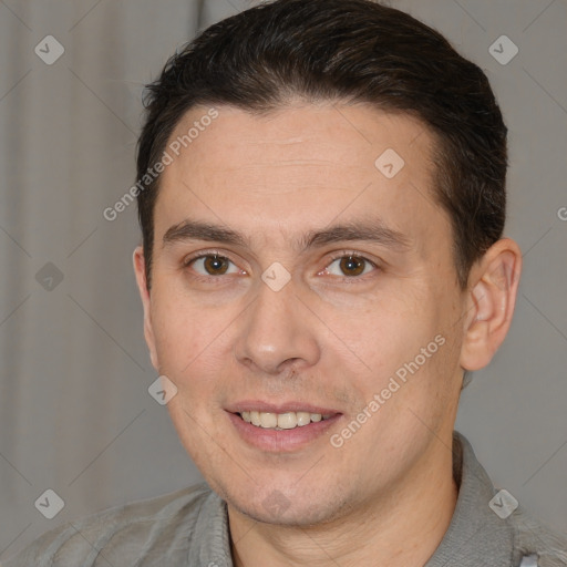 Joyful white adult male with short  brown hair and brown eyes