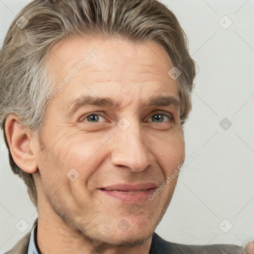 Joyful white adult male with short  brown hair and grey eyes