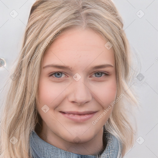 Joyful white young-adult female with medium  brown hair and blue eyes