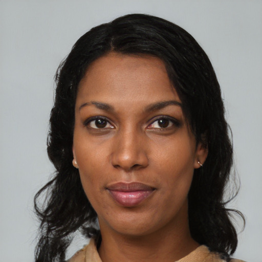 Neutral black young-adult female with medium  black hair and brown eyes