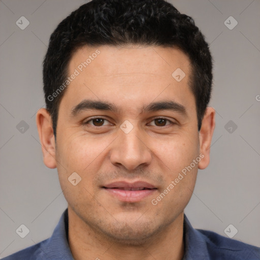 Joyful white young-adult male with short  black hair and brown eyes