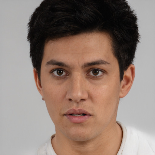Neutral white young-adult male with short  black hair and brown eyes