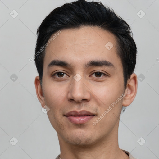 Joyful white young-adult male with short  black hair and brown eyes