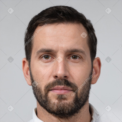 Neutral white young-adult male with short  brown hair and brown eyes