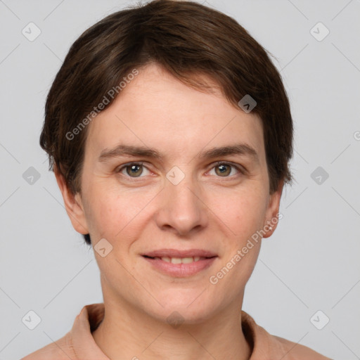 Joyful white young-adult female with short  brown hair and grey eyes