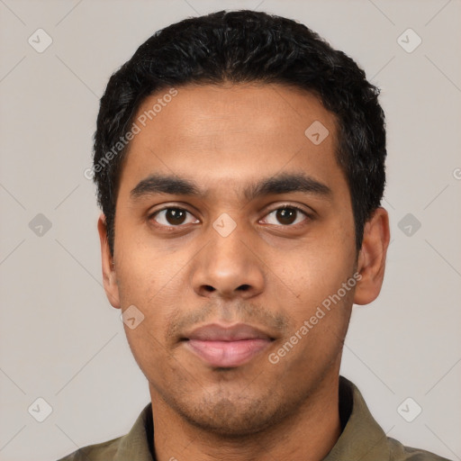 Neutral latino young-adult male with short  black hair and brown eyes