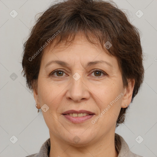 Joyful white adult female with short  brown hair and brown eyes