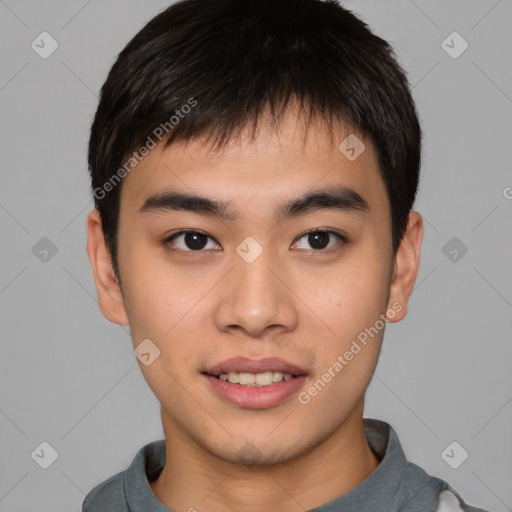 Joyful asian young-adult male with short  brown hair and brown eyes