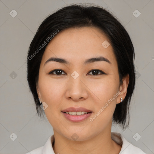 Joyful asian young-adult female with medium  black hair and brown eyes